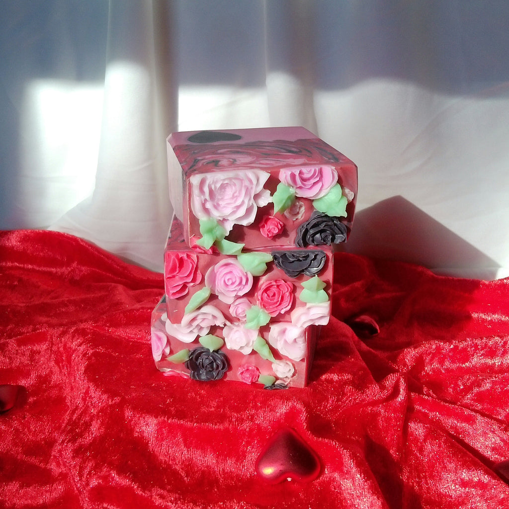 A Lover GIRL handcrafted soap bar placed on a decorative soap dish in a luxury bathroom.